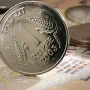 Rupee touches lowest mark at Dollar